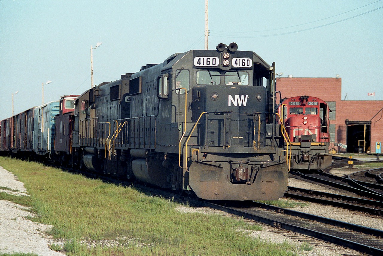 Early evening (8PM-ish) westbound freight with NW 4160 and 4161 about to depart the CN Fort Erie shop complex. That is CN 2015 and 2315 in behind. Unfortunately did not get the N&W van number.