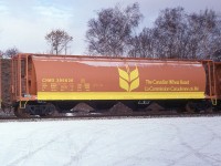 Found this in the negative pile and thought perhaps some of the rolling stock buffs on this site might find this of interest.
Brand new (1-80) Government cylindrical covered hopper car 395626, fresh out of National Steel Car, on its' very first journey westbound. This from the 395000-395999 series back when the Wheat Board was still in existence.
The "single wheat sheaf" paint scheme debuted in 1979.