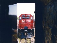 During CP's Logo Train tour in 1997, attendees could tour the train and observe displays inside the cars that showcased the history of the newly revived beaver shield logo. While outside, freshly repainted CP GP38-2 3069 and STL&H 5654 were on display for photographers, gleaming in the morning sunlight at CP's Quebec Street yard in London. Here, STL&H 5654 stares back at those people walking through the cars taking in the history, while showing-off its own still semi-fresh paint scheme that was applied the year prior. 