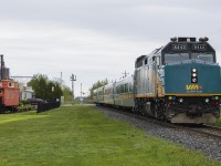 <b> HISTORY PRESERVED </b>...here, VIA 73 passes the preserved relics of railway days gone by. In the photo is a former van, and just off to the left is the beautifully restored station. Where I'm standing would have been on the former station platform, had that station not been replaced by VIA's standard design of shelters. The van I believe is sitting on what would have been the freight, or shed track that usually ran in behind the station. Here in the glory days of railroading, railway employees would load goods to be transported locally or abroad. Just behind me, the westbound main remains intact until the outskirts of Chatham. Here, 73 will glide over the switch and take that main while on the eastbound 76 will make it's station stop to pickup one, lonely traveler. It was a nice surprise to see 76, wrapped in the wonderful <a href="http://www.railpictures.ca/?attachment_id=29551">Canada 150 design led by F40 #6402.</a>  