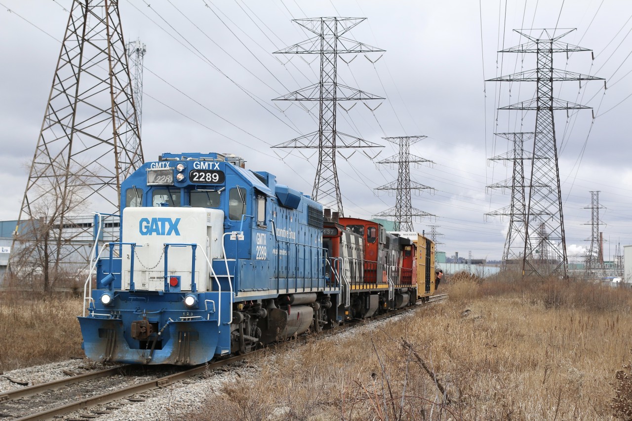 I have never been able to photograph CN switching the furthest surviving section of the old H&NW line that once ran between Hamilton and Burlington West. It is deep in Hamilton's industrial core. The rest of the line for the most part between the two locations was abandoned in the early 1980's. Of course sections of the line beyond the two cities still remain active today as the Halton subdivision and Hagersville subdivision, but this section was unique as it also ran along the shore of Lake Ontario and over a lift bridge (now a public trail). One industry remains at this location at the road crossing of Parkdale Ave. and usually receives boxcars.