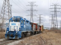 I have never been able to photograph CN switching the furthest surviving section of the old H&NW line that once ran between Hamilton and Burlington West. It is deep in Hamilton's industrial core. The rest of the line for the most part between the two locations was abandoned in the early 1980's. Of course sections of the line beyond the two cities still remain active today as the Halton subdivision and Hagersville subdivision, but this section was unique as it also ran along the shore of Lake Ontario and over a lift bridge (now a public trail). One industry remains at this location at the road crossing of Parkdale Ave. and usually receives boxcars.
