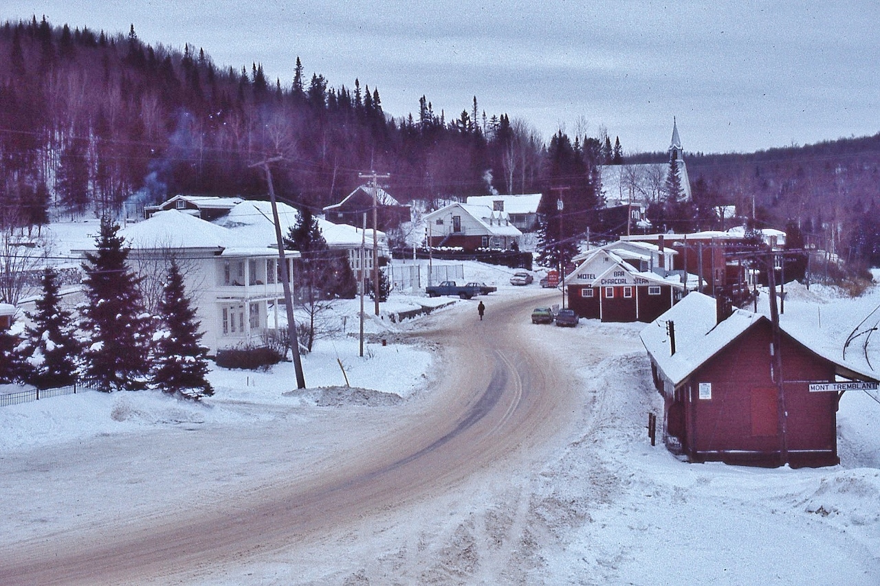 The very quaint Mount Tremblant Village and CP Rail Gare du Mont-Tremblant mile 70.7 Ste. Agathe Subdivision


Serviced six times per week by CP Rail passenger trains #164 (Tue Thur) #167 (M W F) & #172 (Sun) with Dayliners ( Budd Cars)


 At this time CP Rail  freight service was as needed, power typically either MLW RS10 and / or  RS18


 Last VIA Rail Passenger service: Nov 1981


 The CP Rail Ste. Agathe Subdivision from Ste. Agathe mile 44.4 northward officially abandoned December 1989 ( Ste Therese mile zero ) 
 

 from the porch of the (wood framed 3 storey) Mont-Tremblant Hotel December 1976 Ektachrome by S.Danko


 what's interesting


 in front of the Gare du Mont-Tremblant and across the main track is  Lac Mercier 


  today the Mount Tremblant station is the tourist kiosk Place de la Gare  ( google it )
 

 More Ste. Agathe subdivision stations: 


   St Jovite     


   St Faustin     


   La Belle    


sdfourty