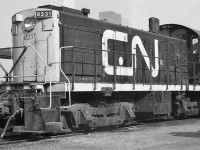 <br>
<br>
…. yard power …. and given....
 <br>
<br>
... GMD F's and MLW FPA's were so common – unlike VIA F40PH-3's today, which are really uncommon compared to the numbers of F's and FPA”s (at that time)  on the respective CN – CP rosters... 
 <br>
<br>
….CN #8231 was an interesting contrast....
 <br>
<br>
 MLW built S-7 ( circa 1957)  awaits next assignment
 <br>
<br>
  at CN  Spadina, spring 1977 Kodak Tri X negative by S. Danko
<br>
<br>
 what's interesting
 <br>
<br>
 Note the plain bearing axles on those trucks – no MU cables – 'road' diesel horn
 <br>
<br>
 all CN 8200's retired or sold by 1985 – to my knowledge VIA did not 'own' any S-7's ( or S-13's )
 <br>
<br>
  assignments for CN 8200's  included coach yard duties at Spadina ( and in Montreal too I believe) to deliver and retrieve passenger, baggage, mail and express cars to / from the coach yard and station, express and post office platforms as well as road power deliveries to /  from the service facilities - and in later years the younger S-13 8500's took over some duties 
<br>
<br>
...background left, that is a converted conventional baggage car ( CCF built ) with head end power plant ( electric generator ) to supply power for TEMPO cars ( when a head end generator equipped RS-18m not available ie CN 3150 to 3155 )... 
 <br>
<br>
 ...[ the TEMPO cars, built by HS and based on the TTC subway cars of same vintage, did not last long in VIA service: most TEMPO equipment sold ( 1988 ? )  to D&RGW for their Ski Train  and in 2009 bought by  ACR Inc. a subsidiary of CN to service the ACR tourist route – an interesting 're-purchase' given CN originated and ordered the TEMPO equipment  new ( an exception for CN )  from  Hawker Siddeley  (Thunder Bay plant )  ]
<br>
<br>
<a href="http://www.railpictures.ca/?attachment_id= 33790">   line up 8200's & 8500's   </a>
<br>
<br>
<a href="http://www.railpictures.ca/?attachment_id= 6873">   8500's on duty   </a>
 <br>
<br>
sdfourty