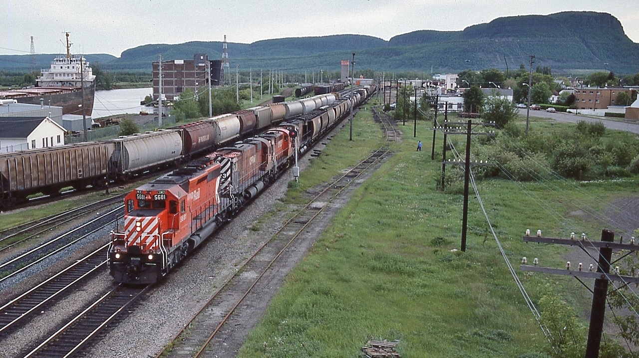...an eclectic mix...


...certainly made rail fanning interesting....


....GMD second gen / MLW second gen /  MLW first gen / MLW second generation...


….SD40-2 / M636 / RS-18u / M636...


….5681 / 4723 / 1828 / 4731....


…..and most interestingly: Green Markers / Green Flags ! ...second section following...


...(unfortunately did not record the train number )


  First CP Rail  '5681'  East, at Thunder Bay June 18, 1985, Kodachrome by S.Danko 


 more Thunder Bay


  a day later   


   T Bay station   
 

sdfourty