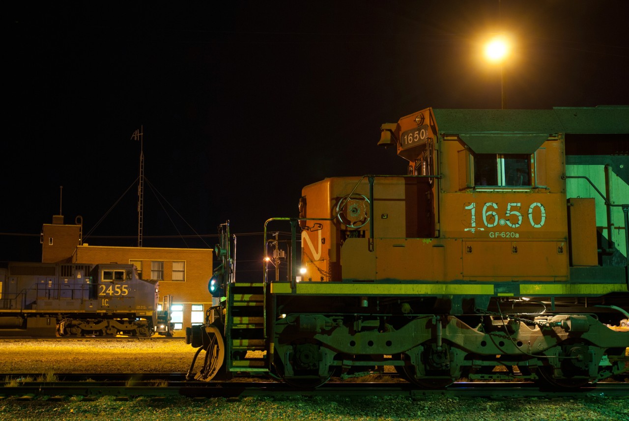 IC 2455 has just finished bringing CN 412 into its destination city of North Battleford SK. But 412's power wont sit long as 411's crew is already on duty and is just waiting on some paperwork at the station. In the foreground sits CN SD38-2 1650, assigned to the CN 506 it will not turn a wheel till 0600 the next morning.