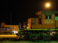 IC 2455 has just finished bringing CN 412 into its destination city of North Battleford SK. But 412's power wont sit long as 411's crew is already on duty and is just waiting on some paperwork at the station. In the foreground sits CN SD38-2 1650, assigned to the CN 506 it will not turn a wheel till 0600 the next morning. 
