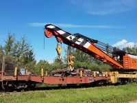 This photo was taken when the crane and the idler flatcar were parked along the access road. This piece of equipment is used by the museum staff moving large equipment when the need arises.