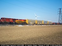 CP 8731 and KCS 4865 lead train #141 as it approaches the Rochester Townline just east of St. Joachim, Ontario.  Due to issues with the power 141 could only maintain a whopping 25mph the whole way from London to Windsor making for a 4+ hour long trip to cover the 100 or so miles across the Windsor Sub.