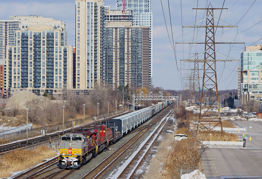 After working Lambton Yard for over an hour and change, Toronto to CSXT Frontier Yard train 246 is well under way trying to accelerate up to track speed with 12,000 tons of mix freight.