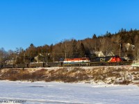 With a lashup to make Foamers drool, CN 2101 and BCOL 4609 lead a small train 406 as they skirt along the Kennebacasis River, at Renforth, New Brunswick, as sunset slowly gets closer.  