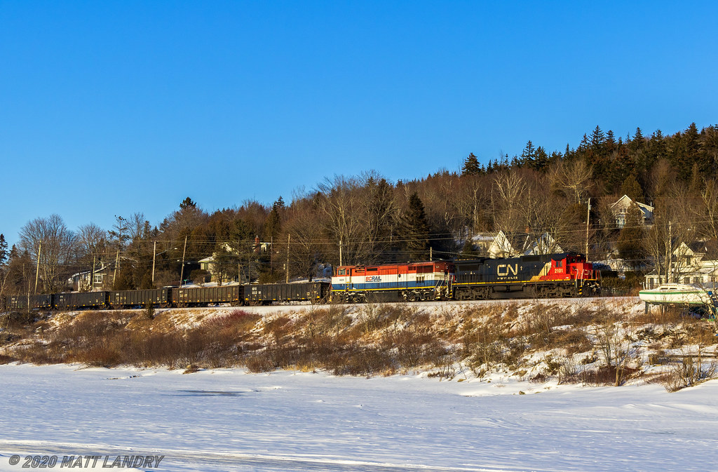With a lashup to make Foamers drool, CN 2101 and BCOL 4609 lead a small train 406 as they skirt along the Kennebacasis River, at Renforth, New Brunswick, as sunset slowly gets closer.