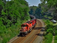 Jumping on the Aberdeen wye theme, but facing the other way.  Just after the rolling meet between 246 and the rail train seen in <aJames Knott'shref="http://www.railpictures.ca/?attachment_id=40370">http://www.railpictures.ca/?attachment_id=40370</a> recent posting, the rail train would reverse to drop off a few more strands before heading North up the Hamilton sub through Guelph Junction bound for Lambton Yard to call it a day.  A pair of spartan cabs lead the charge in the form of SD40-2 6054 and SD60 6257.