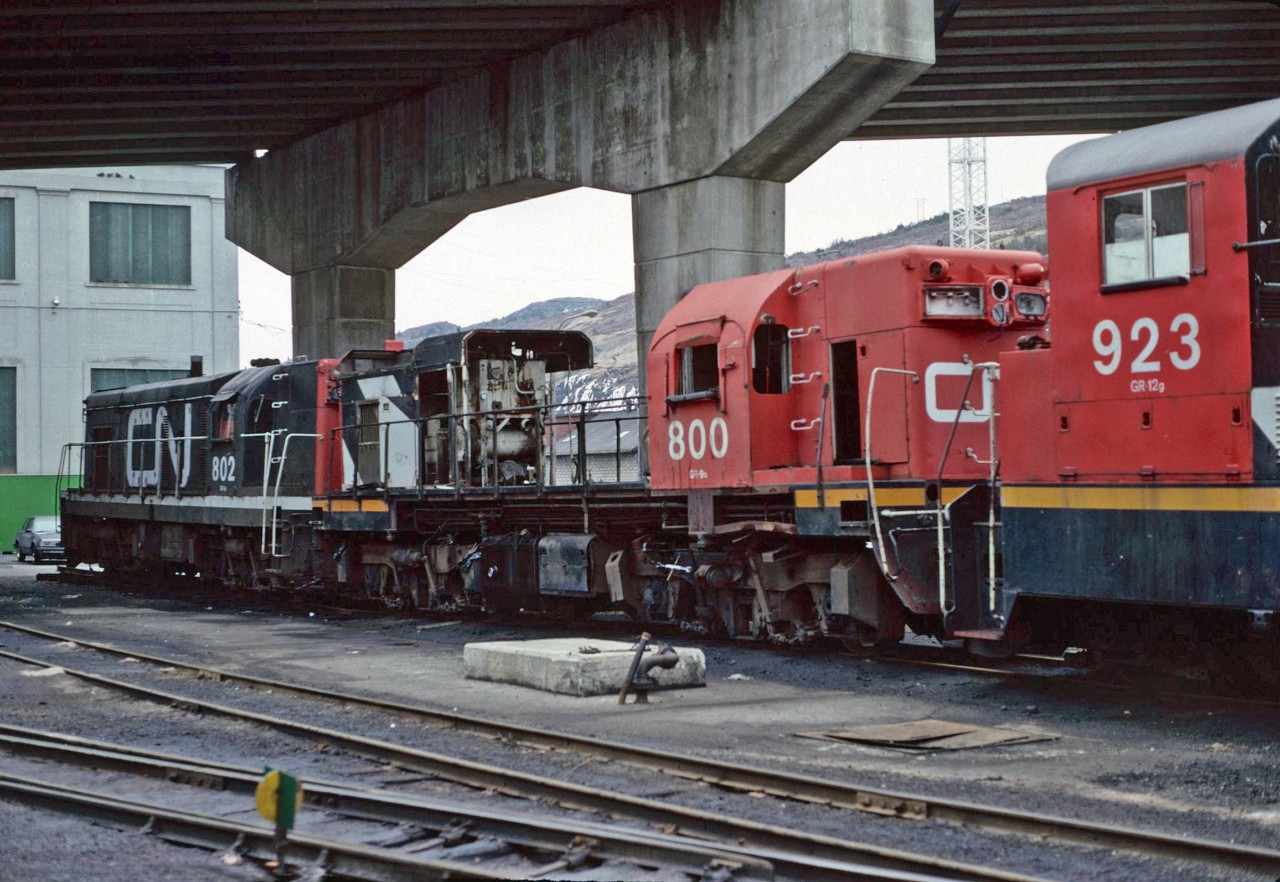 It is hard to believe that the CN shut down operations in Newfoundland coming up on 32 years ago. In March 1988, the mainline was still running, but so many of the branches had already seen the last train.  The little 800 series G-8's which had plied those rails for so long were now redundant, and as seen in this image, they were slowly being cut up.  A sad sight indeed at the St Johns CN shop.