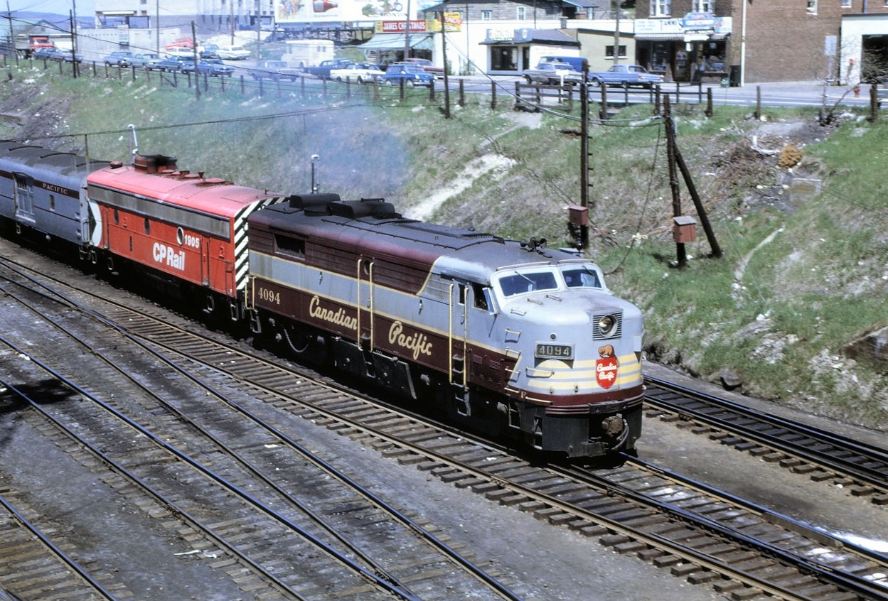 CP train 12, the Toronto section of the Canadian, heads out of Sudbury on May 23, 1969.  Power for the train is 4094 and 1905.