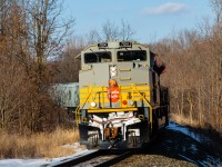 Easing down the mountain grade at Waterdown, Ontario with 12,000 tons on the drawbar, script-painted SD70ACu 7014 looks phenomenal in the afternoon sun. In the 1960s, the CPR emblazoned their locomotives with this very paint scheme. Today, a handful of Canadian Pacific's former SD90MACs, which were seemingly destined for the scrapper’s torch, now display the company’s proud heritage and roll on — serving a reminder of the railway’s significance both past and present. Simply put, Tuscan and grey is always in style.