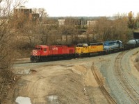 CP C424 4210, CP SD40-2 5422 and GATX SD40-2 7367 lead a southbound train through Hamilton as it heads to Aberdeen Yard. The mid-1990’s was a great time to photograph CP with its army of colorful lease units as well as its remaining MLW roster running out their last years of service on the railway. 
