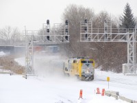 VIA 624 heads east on the south track of CN's Montreal Sub, with CN 120 visible in the background on the north track.