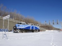 On a line that sees no regular EXO service, a light move of AMT 1341 is heading east as it passes Turcot Ouest. Barely visible at right is a parked CN 305.