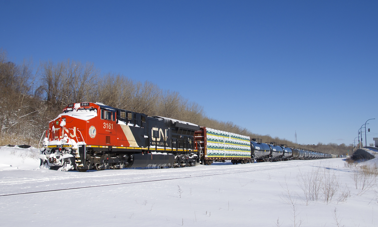 CN 305 has been parked at Turcot Ouest since Friday morning and countless other trains are parked between Toronto and Montreal. This is due to a protest on CN's main line along Tyendinaga Mohawk territory, which has seen both freight and passenger trains unable to pass there since Thursday.