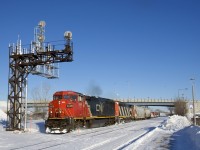 CN 2449 & CN 2445 lead a 125-car CN 373 through Dorval on a sunny and cold afternoon.