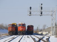 A trio of trains are parked just east of Belleville Yard (M37231 07, M30631 06, and M37631 06, all have since been given new ID's) and have been stuck here over two weeks now due to a protest on CN's main line along Tyendinaga Mohawk territory, which has seen both freight and passenger trains unable to use CN's busy Kingston Sub at a point a bit east of here.