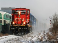 CN L568 is approaching Park Street as it departs Kitchener westbound on the Guelph Subdivision during a day that had its fair share of snow squalls. The consist included; CN 1439, GMTX 2279 and GMTX 2289. 