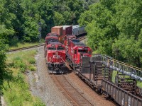 To offer a contrast in views from <a href="http://www.railpictures.ca/?attachment_id=40369" target="_blank">Jason Noe's recent shot</a> of a southbound heading into Aberdeen Yard, here is a view from the same bridge some 24 years later. The trains are on different tracks, of course, but you can see changes such as the double tracking and search lights. Quite a bit of vegetation has grown in too. <br><br>This was a rolling meet between the southbound 246 and a rail train that had been setting off rail in the area all morning.
