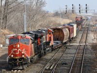 CN train 435 is hot on the heals of a westbound stack train that I'm guessing was 149 (it had Mid train DPU and didn't work Aldershot so unsure). CN 435 is seen rolling through the crossover at Snake so it can get around 421's train. CN 421 can be seen in the background and has just finished dropping a GMTX GP38 for the local crew to pick up. It was a pretty busy Monday morning with 148 out of sight lifting in the yard and 422 nearing Hamilton.