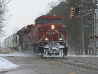 This hobby is always full of firsts, it just depends on how long it takes one to witness theirs. This past Friday certainly had a main event feel to it, as CN L540 departed Stratford for a return to Kitchener with CP 8616 in the lead. Previously, CN 533 had died the night before in Kitchener and the trailing unit was CP 8616. CN L540 would take the two GE's and a block of cars west to Stratford to lessen the congestion in a full yard at Kitchener. While it was rare enough for CN L540 to venture west of Kitchener, it was even more layered as it would take 533's power, with one unit being CP 8616. CN L540 is seen stopping traffic in all directions as it heads eastbound through Baden returning to Kitchener. So for me this was the first time I had ever photographed a CP unit leading a train on the CN Guelph Subdivision.