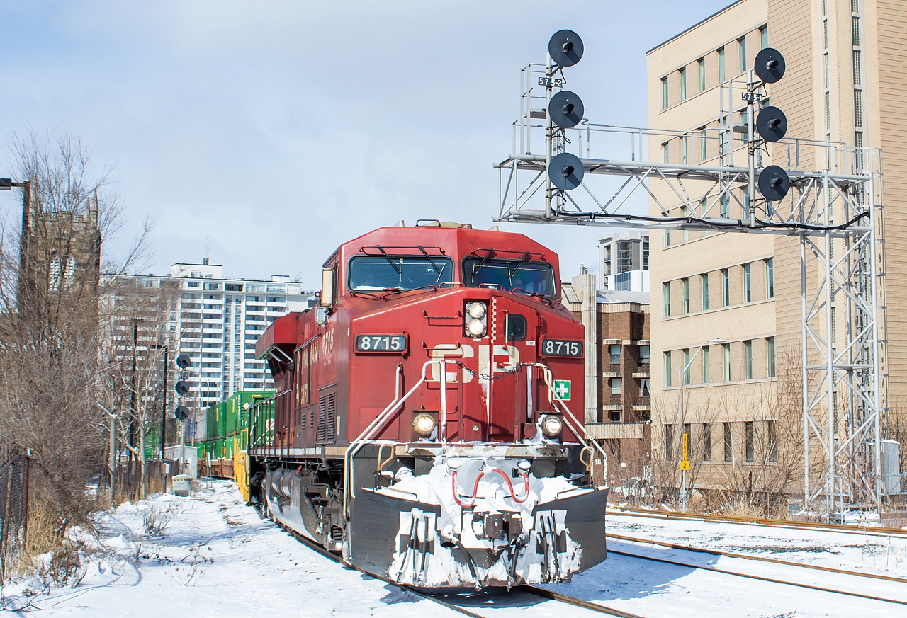 A late 143 led by CP 8715 heads into Hamilton after meeting a late 247 (9715 North) at Desjardins. 143 had a mid-train DPU, which the crew was talking with RTC about moving to the head end at Welland as apparently some CSX crews are not qualified for remotes. Before they got to Welland though they would be meeting a detouring 651 (9369 North) in Smithville. 651 would then meet 246 (8834 South) at Desjardins, before stalling and requiring a push from TH11 to get up the hill. All told, it was quite the flurry of daylight action on an otherwise typically dead Hamilton Sub. I only managed to grab this 143, though - I was working from home yesterday and it's a very short walk down to GO Station (aka begin/end CTC sign Park) so I scooted out quick for this one. Regrettably, I let 651 pass me by, which may have been the last of the detouring ethanol trains for now as 650 took its normal routing yesterday.