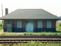My dad and I would usually venture to the town of Pairs on either Saturday or Sunday mornings to check out the action on the CN Dundas Subdivision. You were always guaranteed some trains that could range from the intermodal “Lasers” 238 and 239, as well as 380, 381, 410 and 411. Trains 380 and 381 ran between Toronto and Windsor, while 410 and 411 operated between Toronto and Sarnia. Also, you would have the usual morning VIA trains as well as occasionally a local from Hamilton that ran to the pit in Paris. I’m assuming on this morning, the signals around town were all red so we ventured down to where the second train station had once stood. Long since torn down, the only thing that remained was the CN express building that was now used for storage at the time. The problem with where the building was situated was that the front of it was never really in good lighting, only maybe at certain points during the longer days of the year. However, at the time I was just fairly new to the hobby so lighting and sun positioning hadn’t really factored into my photography decisions. If it had, I probably never would have taken the photo seeing as how I was shooting more or less in the direction of the sun and on a backlit subject. In the years that followed I don’t believe I ever took another stand-alone photo of the building, only just including it in frames of trains going by. Then one day we went back and it was gone. 