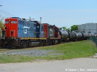 A rare visitor to Canada with a GTW GP9 paired with CN 7058 as they switch Imperial Oil's lubricants facility in Sarnia. Most of this facility has since been demolished, except they do still have the loading racks for product, but rail traffic is a fraction of what it once was from this side.

