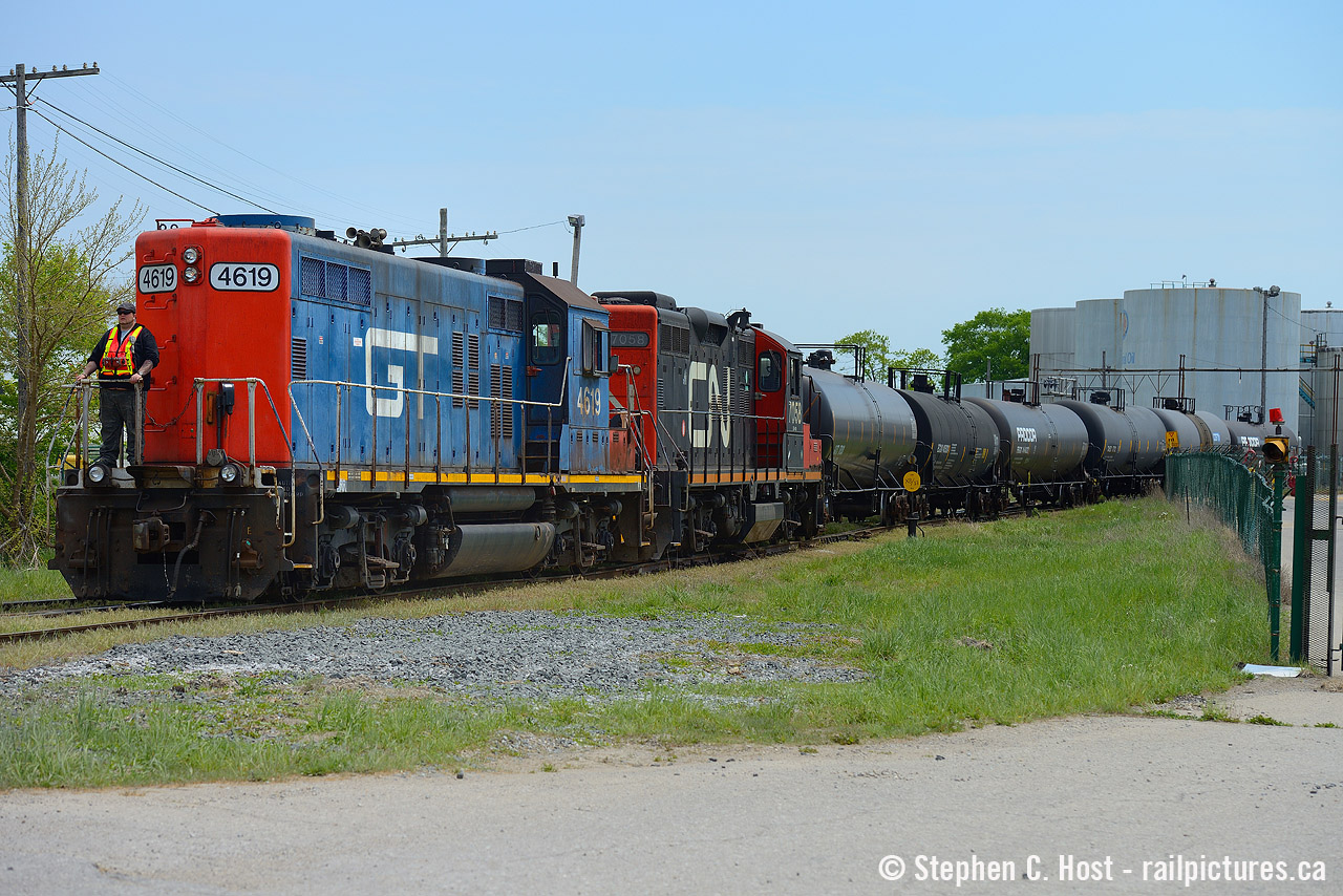 A rare visitor to Canada with a GTW GP9 paired with CN 7058 as they switch Imperial Oil's lubricants facility in Sarnia. Most of this facility has since been demolished, except they do still have the loading racks for product, but rail traffic is a fraction of what it once was from this side.