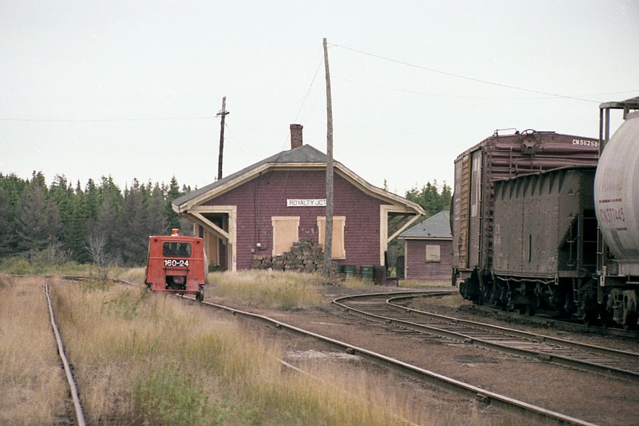 The old Royalty Jct station, I assume long gone. Boarded up as you can see in 1977. The trackage on the right, goes to Souris, Georgetown, etc. The line on the left, to Borden, Summerside & Tignish, where the track car appears to be heading. Behind me, facing south is Charlottetown. I am standing at the south end of the wye. The section shed, utilized by for trackcar storage and other tools of the road, used to be the a station over at Suffolk.