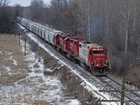 Having successfully (and slowly) navigated the gaggle of grade crossings that is the Havelock Sub through Peterborough, T07 has finally made it to the west side of town and the way is now clear. They'll still be picking their way west along the 10mph trackage, but at least they have fewer automobiles to worry about. 1412hrs.