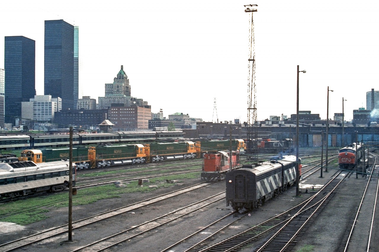 This image of the CN Spadina engine terminal is from Toronto in June 1972. The green and yellow units are MLW locomotives destined for Mexico.