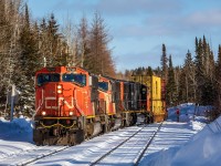 Dodging increasingly long shadows, a trio of handsomely matched EMD SD75is guide Canadian National detour train no. 131 onto the wye at Swastika Junction. After swinging off of the Ramore Subdivision, 131 would traverse Ontario Northland's picturesque Kirkland Lake Subdivision for the 60-mile journey to Rouyn-Noranda, Quebec. Once at Noranda and back on home rails, the slow, albeit scenic, journey through to Montreal continues.