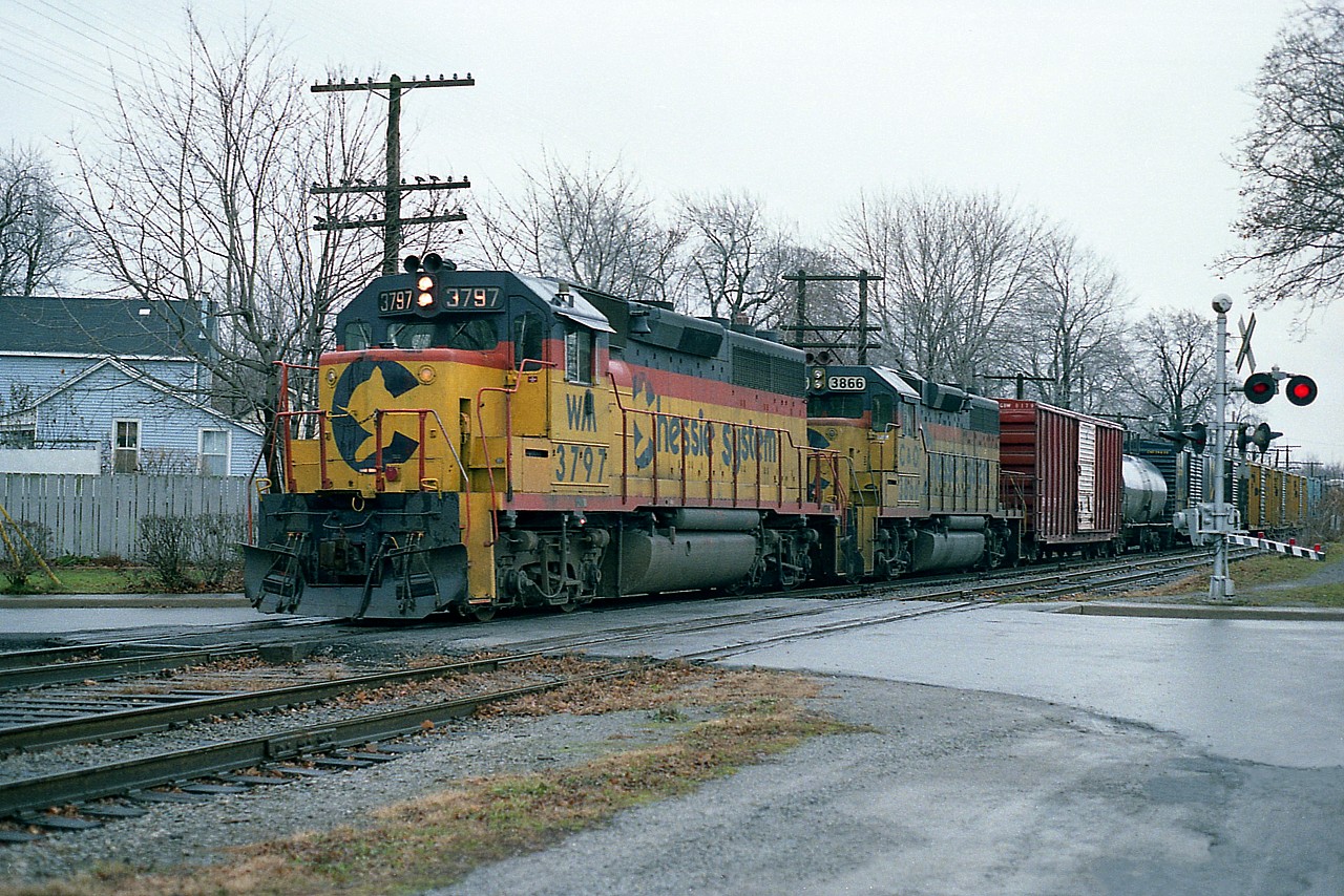 Not often did I see a locomotive marked for Western Maryland thru here, even though it was part of "Chessie".
In this late day image, WM 3797 and C&O 3866 have made their way thru Niagara Falls and are but a couple of blocks from heading over the bridge to the US of A.