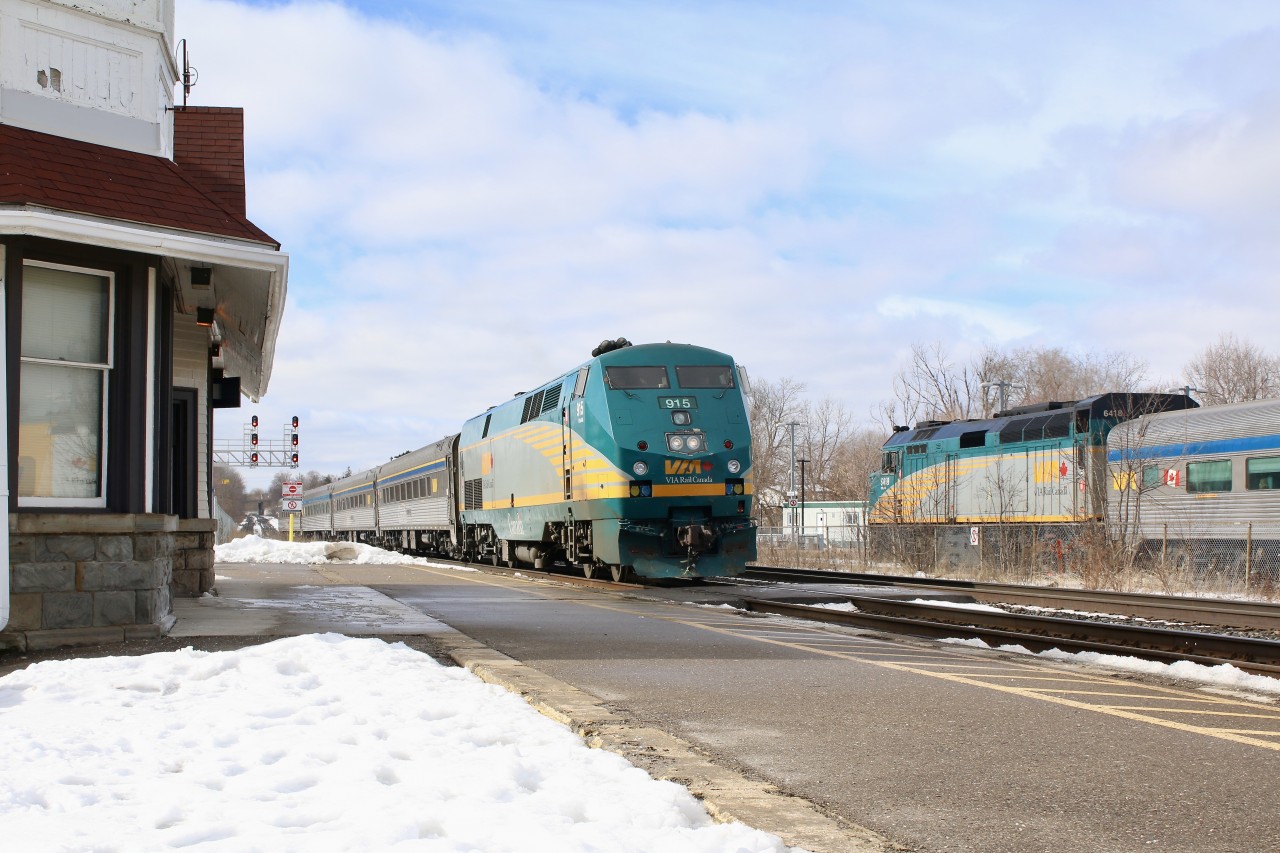 Things got a little interesting with a broken rail on the Guelph subdivision delaying train 84 by a couple hours, then CN 570 had a hot wheel backing up traffic near Milton. In the end VIA train 85 was diverted to one of the GO Transit storage tracks in Georgetown for about an 45 minutes to wait for the arrival of train 84. Here the two train can be seen meeting at the station, in a minute one passenger will board and both trains will be on their way.