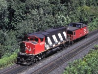 CN 9433 is westbound in Burlington, Ontario on August 11, 1987. She is nearing Bayview Junction, Ontario.