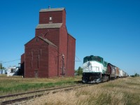 GW Rail M420 #2000 passes the elevator at Viceroy Saskatchewan on a beautiful September afternoon.