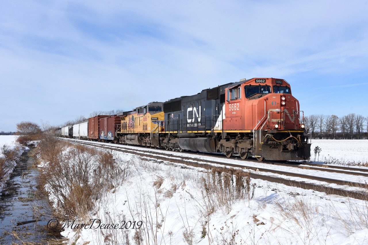 CN 5662 leads train 270 east out of Sarnia, ON., with UP 6686 trailing on one of the rare days we had snow this winter.