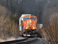 A pair of worn SD75is lead the Calgary-Toronto intermodal train #114 south through mile 39 of the Bala Sub. I would prefer seeing these units any day over a pair of GEVOs, although this particular engine had a terrible horn, I must say.