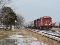 CP T07 finishes doubling up hoppers for their trip to Agincourt Yard in Scarborough with SOO 4410 taking the lead that inspired many people to chase it down its 10 mph journey to the GTA. The ditch light on the right started working as they were getting ready to depart Havelock but as they rounded the curve westbound along Highway 7, it decided to burn out again and never turn back on. Not sure what the deal is with that but it added an interesting affect to the unit along the chase on this cloudy mild day.  