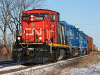 CN L568 with 1439 in the lead switches the Kitchener yard on a sunny winter afternoon. The trailing units were GMTX's 2279 and 2289.