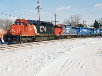 After a fun chase from Copetown to Paris, things became even more rewarding as CN 391 began slowing down as it crossed the Grand River bridge in Paris on the Dundas Subdivision as seen here.

http://www.railpictures.ca/?attachment_id=40621

The lengthy train would eventually come to a stop at the Market Street crossing in Paris to allow VIA Rail #73 to scoop it. This gave photographers ample time to enjoy the consist that included;  6027, GT 5809, Conrail’s 6660 and 6751. Conrail SD45-2 6660 was on lease to power-short CN while SD50 6751 was working-off horsepower hours owed to CN at the time. Once 73 had cleared Pairs West, CN 391 eventually got the light to proceed westward as pictured here and man did that sound great. 