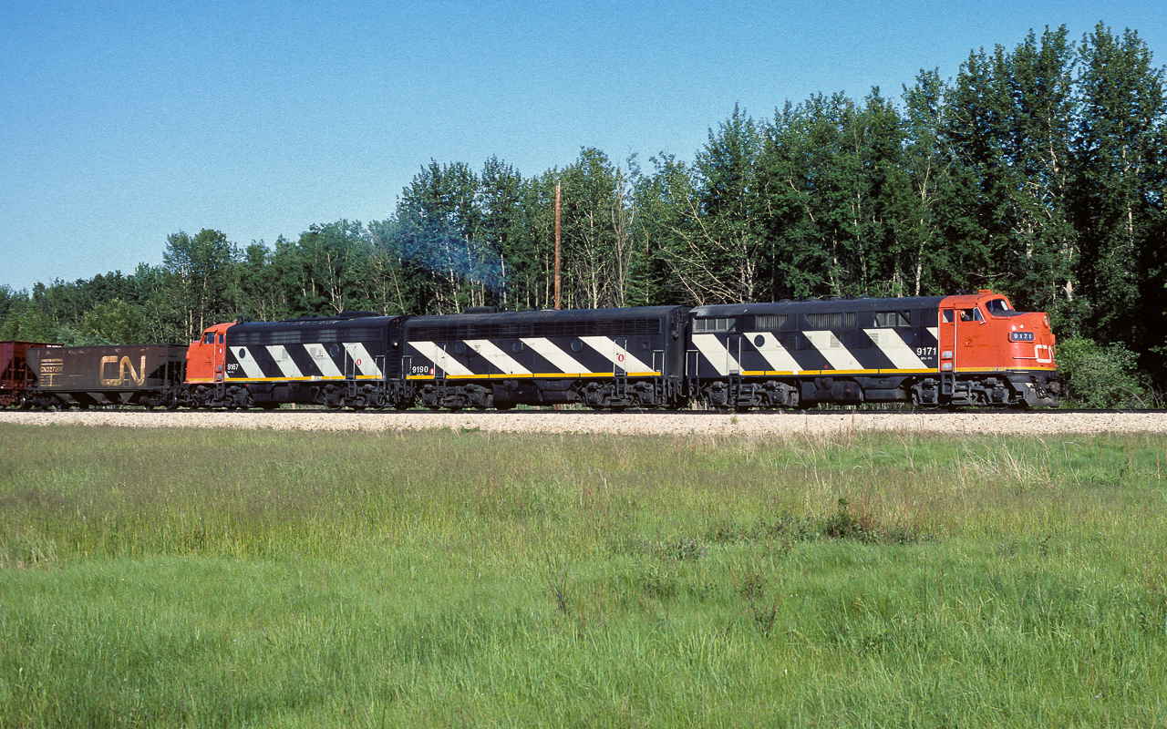 The 9171 has just entered the south end of the connecting track and will head north to the Lac La Biche Sub and on wards to Waterways. For a train geek, having the connecting track installed was a great asset if you lived in Redwater. It pretty much doubled the number of trains per week through town and made consists like this easy prey for the camera.  Take care everyone as we head into several weeks of isolated living.