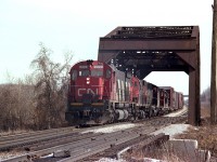 Hard to place this shot. On the map, St. Catharines, Niagara Falls and Thorold South all come together about here. On the railroad, this was known as CN Iron Bridge, mile 7.7 Grimsby Sub.. Westward running we see CN 2328, 3223, 9635, 4505 and 4580. Last two units I am sure at the time were based in Fort Erie.Anyway, nice winter morning, nice variety of power.