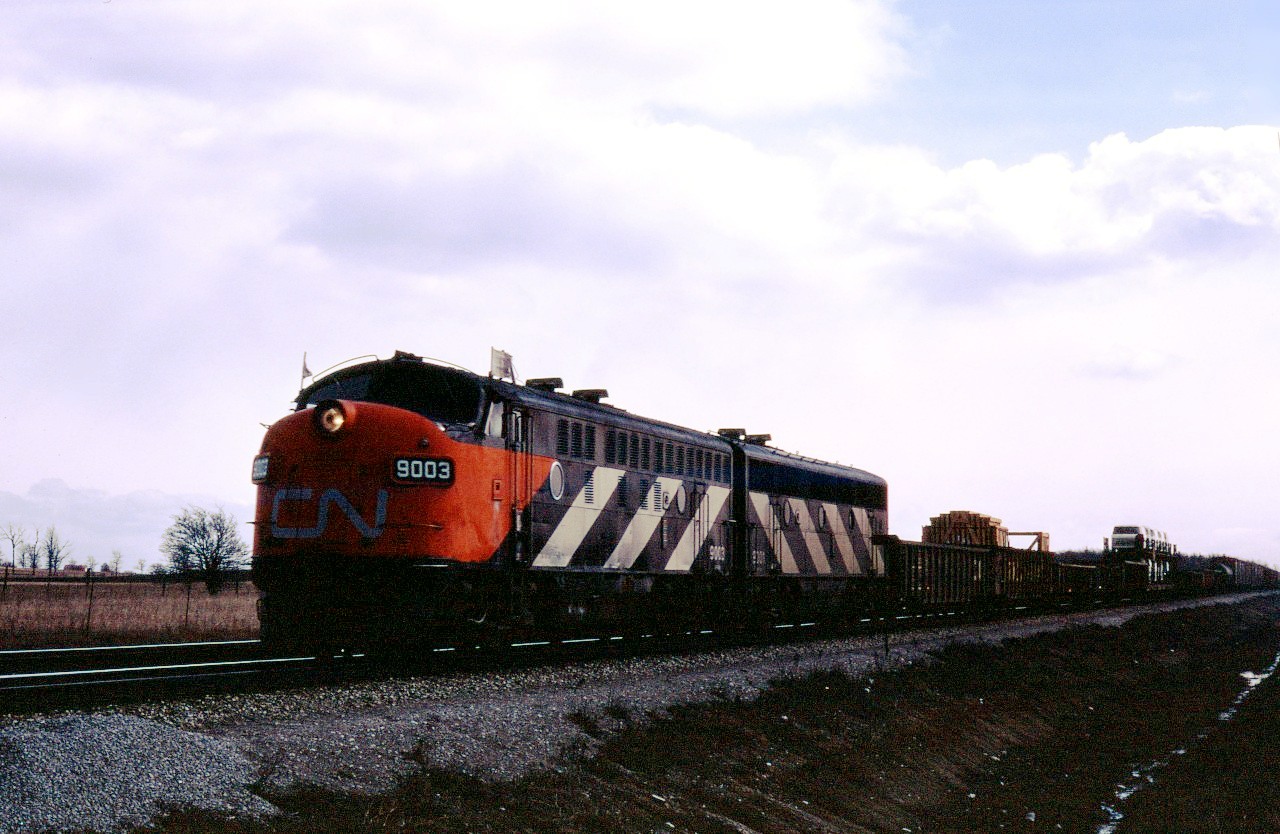 Built in May 1948 at LaGrange (Illinois), two of CN's earliest diesels lead an eastbound freight up the Halton sub in early 1970. According to the January 1970 UCRS Newsletter, units F3 units 9001-9004 were assigned to Fort Erie for maintenance and often used on trains 390-391 between Toronto Yard and White River Jct, Vermont.